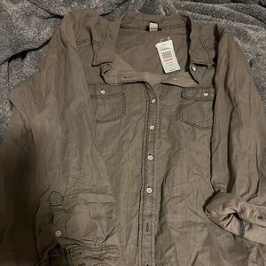 Brand new denim shirt. Never worn. With tags